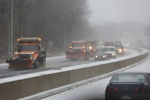 trucks in snowstorm